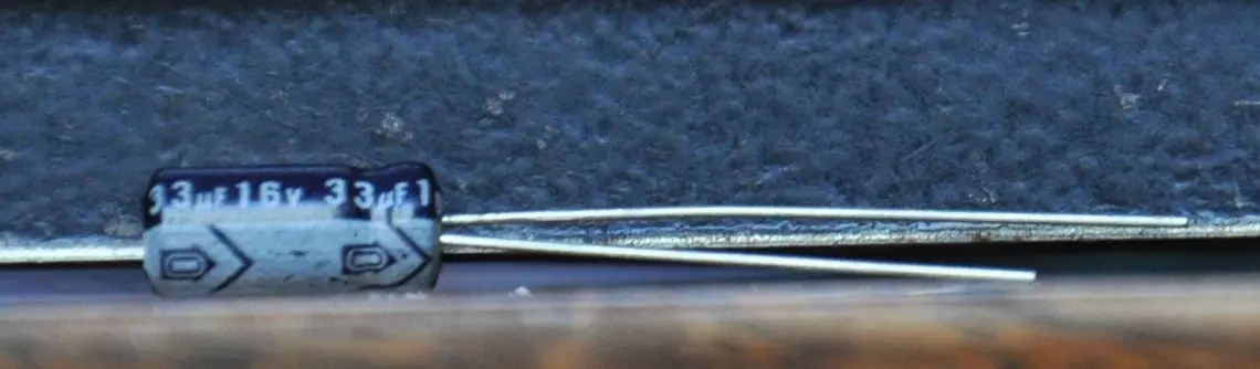Standing electrolytic capacitor